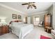 The main bedroom features crown molding, neutral paint, and an ensuite bathroom at 1515 Paul Boyd Rd, Clover, SC 29710