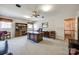 Comfortable office space featuring a desk, built in bookcase, two chairs, and neutral carpeting at 1515 Paul Boyd Rd, Clover, SC 29710
