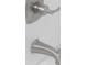 Close up of a brushed nickel shower faucet with sleek handle and modern design on white tile at 1587 Green Circle Dr, Gastonia, NC 28054