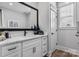 Bathroom with a stylish white vanity, black faucet and ample natural light at 1925 Hendricks St, Rock Hill, SC 29732