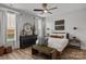 Bedroom with decor and furniture bathed in natural light from two large windows at 1925 Hendricks St, Rock Hill, SC 29732