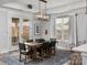 Open dining area with backyard access and contemporary lighting, ideal for Gathering meals and gatherings at 1925 Hendricks St, Rock Hill, SC 29732