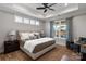 Beautiful main bedroom with tray ceilings, a ceiling fan and great natural light at 1925 Hendricks St, Rock Hill, SC 29732