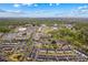 Aerial view of the neighborhood with shopping nearby and showing the location of the featured townhome at 19737 Playwrights Way, Cornelius, NC 28031