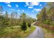 Community walking greenway with paved road and a beautiful outdoor experience at 19737 Playwrights Way, Cornelius, NC 28031