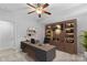Stylish home office with custom built-ins, desk, and a cozy workspace at 19737 Playwrights Way, Cornelius, NC 28031