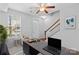 Bright room staged as home office showcasing a clean and functional workspace at 19737 Playwrights Way, Cornelius, NC 28031