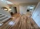 Entryway with hardwood floors, coat closet, bright natural light, and kitchen view at 201 Riverview Ter, Lake Wylie, SC 29710