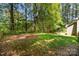 Large backyard featuring a wood fence, providing a secure and private outdoor living space at 2014 Cardinal Loop, Stanley, NC 28164
