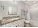 Bathroom featuring granite countertops, shower and tub combo and hard surface floors at 2014 Cardinal Loop, Stanley, NC 28164