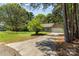 Quaint home with long driveway and large front yard, creating a serene and inviting atmosphere at 2014 Cardinal Loop, Stanley, NC 28164