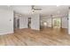 Expansive living area showcasing wood-look floors and an open layout, ideal for modern living and entertaining at 2014 Cardinal Loop, Stanley, NC 28164