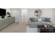 Spacious basement featuring custom cabinets and a cozy seating area, ideal for entertainment and relaxation at 215 Wyanoke Ave, Charlotte, NC 28205