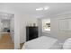 Serene bedroom featuring a large window and a closet, offering a peaceful retreat at 215 Wyanoke Ave, Charlotte, NC 28205
