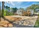 Spacious home featuring decks, offering a beautiful exterior and ample outdoor entertaining space at 215 Wyanoke Ave, Charlotte, NC 28205
