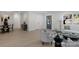 Bright, open-concept living room with modern furnishings and plenty of natural light at 215 Wyanoke Ave, Charlotte, NC 28205
