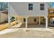 Under-deck parking and patio, great for easy access and outdoor enjoyment at 215 Wyanoke Ave, Charlotte, NC 28205