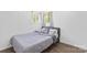 A cozy bedroom features natural light and modern wood look flooring for a peaceful retreat at 2403 Earley Cir, Kannapolis, NC 28083