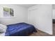 Comfortable bedroom with hardwood floors, a window for natural light, and a closet for convenient storage at 2403 Earley Cir, Kannapolis, NC 28083