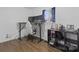 Office/bedroom complete with desk, custom chair, and modern wood look flooring at 2403 Earley Cir, Kannapolis, NC 28083