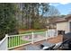 Backyard with seating, firepit, and wooded scenery with outdoor lounging space at 2587 Penngate Dr, Sherrills Ford, NC 28673