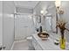 Renovated bathroom featuring tile floors, a vessel sink, and walk-in shower with glass door at 2587 Penngate Dr, Sherrills Ford, NC 28673