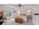 Main bedroom featuring a large window, wood accents, and a decorative ceiling at 2587 Penngate Dr, Sherrills Ford, NC 28673