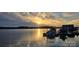 Scenic lake view showcasing the dock with boats parked, under a sunny sky, perfect for waterside enjoyment at 2587 Penngate Dr, Sherrills Ford, NC 28673