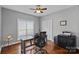 Home office with wood floors, neutral paint, a large window, and standard closet at 2587 Penngate Dr, Sherrills Ford, NC 28673