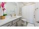 Full bathroom with quartz countertop, and a shower with gold fixtures at 3111 Everly Enclave Way, Charlotte, NC 28210