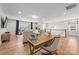 Open concept living room with hardwood floors and desk workspace at 3111 Everly Enclave Way, Charlotte, NC 28210