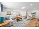 Spacious living room with hardwood floors and a large seating area at 3111 Everly Enclave Way, Charlotte, NC 28210