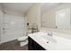 Bright bathroom with tub and shower combo, and vanity cabinet offering style and functionality at 4006 Stockbrook Dr, Charlotte, NC 28215