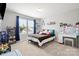 Well-lit bedroom with carpet, neutral walls, and decor creates a comfortable and inviting space at 4006 Stockbrook Dr, Charlotte, NC 28215