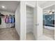 Spacious walk-in closet connected to bedroom has plenty of space for storage at 4006 Stockbrook Dr, Charlotte, NC 28215