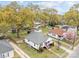 Aerial view of a charming single-Gathering home highlighting lush greenery, mature trees, and neighborhood setting at 405 E 3Rd St, Kannapolis, NC 28083