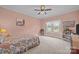 Spacious bedroom boasts lots of natural light and plush carpeting, creating a comfortable and inviting retreat at 405 E 3Rd St, Kannapolis, NC 28083