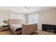 Bedroom featuring neutral walls, plantation shutters, plush carpet, and a king bed at 420 Woodlark Ct, Indian Trail, NC 28079