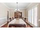 Formal dining room with hardwood floors and classic decor at 420 Woodlark Ct, Indian Trail, NC 28079