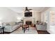 Comfortable living room showcasing a fireplace, neutral tones, and stylish decor at 420 Woodlark Ct, Indian Trail, NC 28079