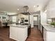 Modern kitchen with stainless steel appliances, granite countertops, and a center island at 445 Short Hills Dr, Charlotte, NC 28217