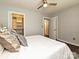 Bright main bedroom with a walk-in closet and ensuite bathroom at 445 Short Hills Dr, Charlotte, NC 28217
