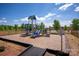 Community playground with blue slides and play equipment on sunny day at 508 Maddox Dr, Shelby, NC 28152