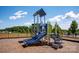 Community playground featuring slides and play equipment on woodchips at 508 Maddox Dr, Shelby, NC 28152