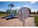 Close up of 'Welcome' sign at community playground with slides and play structure at 508 Maddox Dr, Shelby, NC 28152