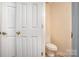Bathroom with a white toilet and white walls at 5301 Amity Springs Dr, Charlotte, NC 28212