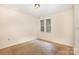 Bedroom featuring neutral carpet and a window at 5301 Amity Springs Dr, Charlotte, NC 28212