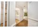 Inviting entryway leads to an open floorplan and bright kitchen, showcasing the home's flow at 5301 Amity Springs Dr, Charlotte, NC 28212