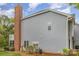 Home featuring a large brick chimney and ample space for outdoor activities at 5301 Amity Springs Dr, Charlotte, NC 28212