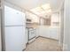 Functional kitchen with a full appliance package and white cabinetry has all the necessities at 5301 Amity Springs Dr, Charlotte, NC 28212